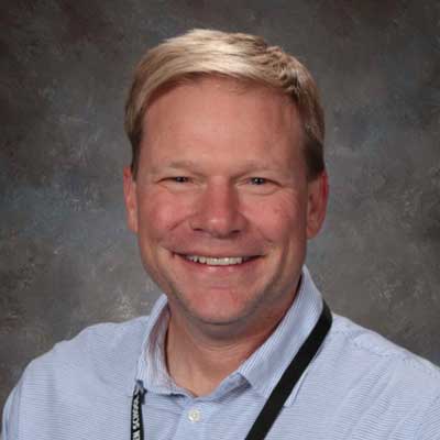 Headshot of Chris Elliot