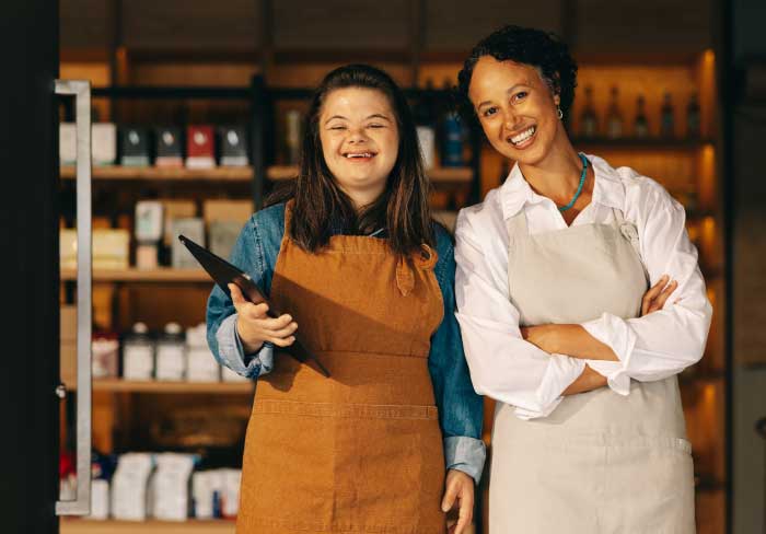 Female with downs syndrome working in a retail store